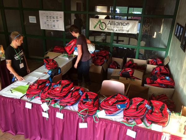 Alliance staff prep registration swag from @CamelBak and @PrimalWear for @BikeWalk #LR14 http://t.co/05ol9s7zyX
