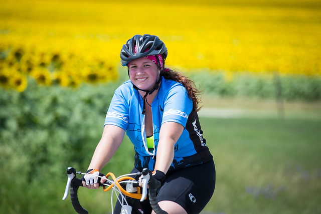 Cyclist with sunflowers