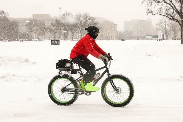 Snow cyclist on Madison Av by Joe Flood